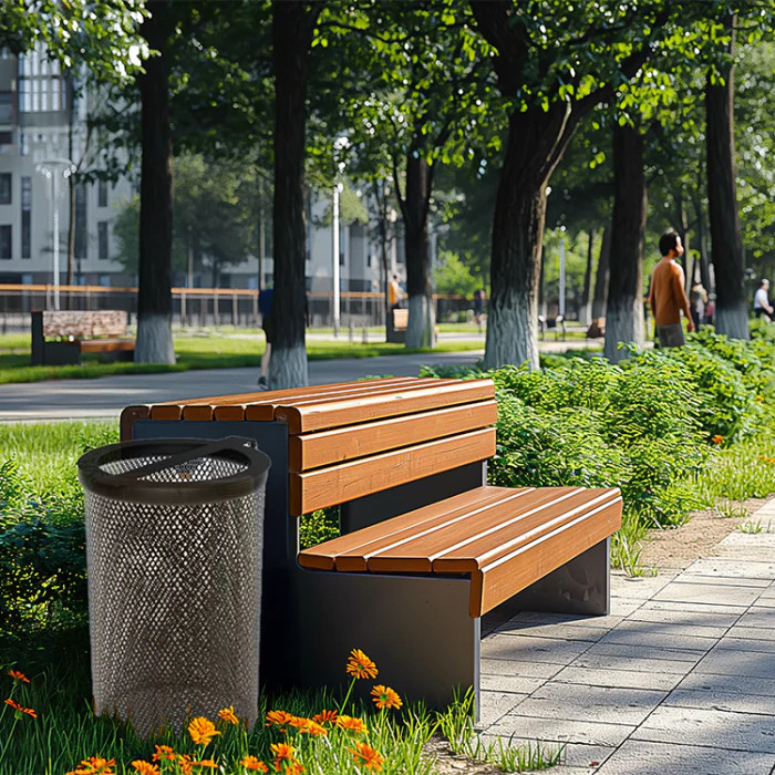 Un banc urbain avec une poubelle associée